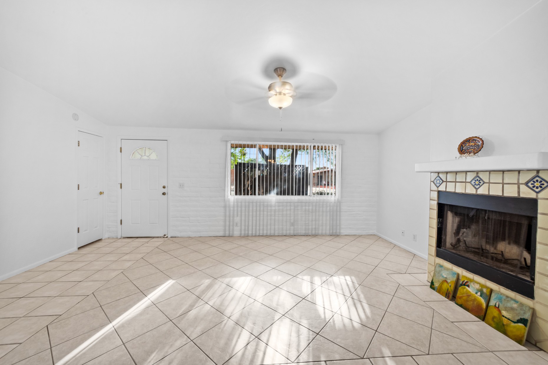 Living room with brick fireplace