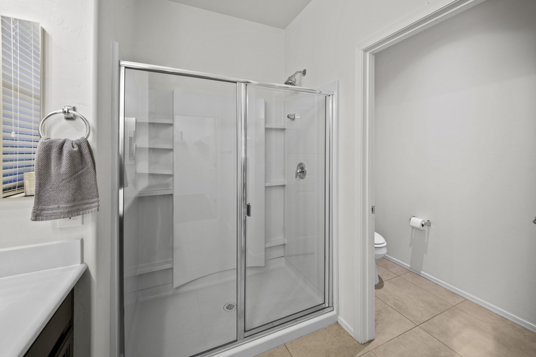 Bathroom with glass shower enclosure