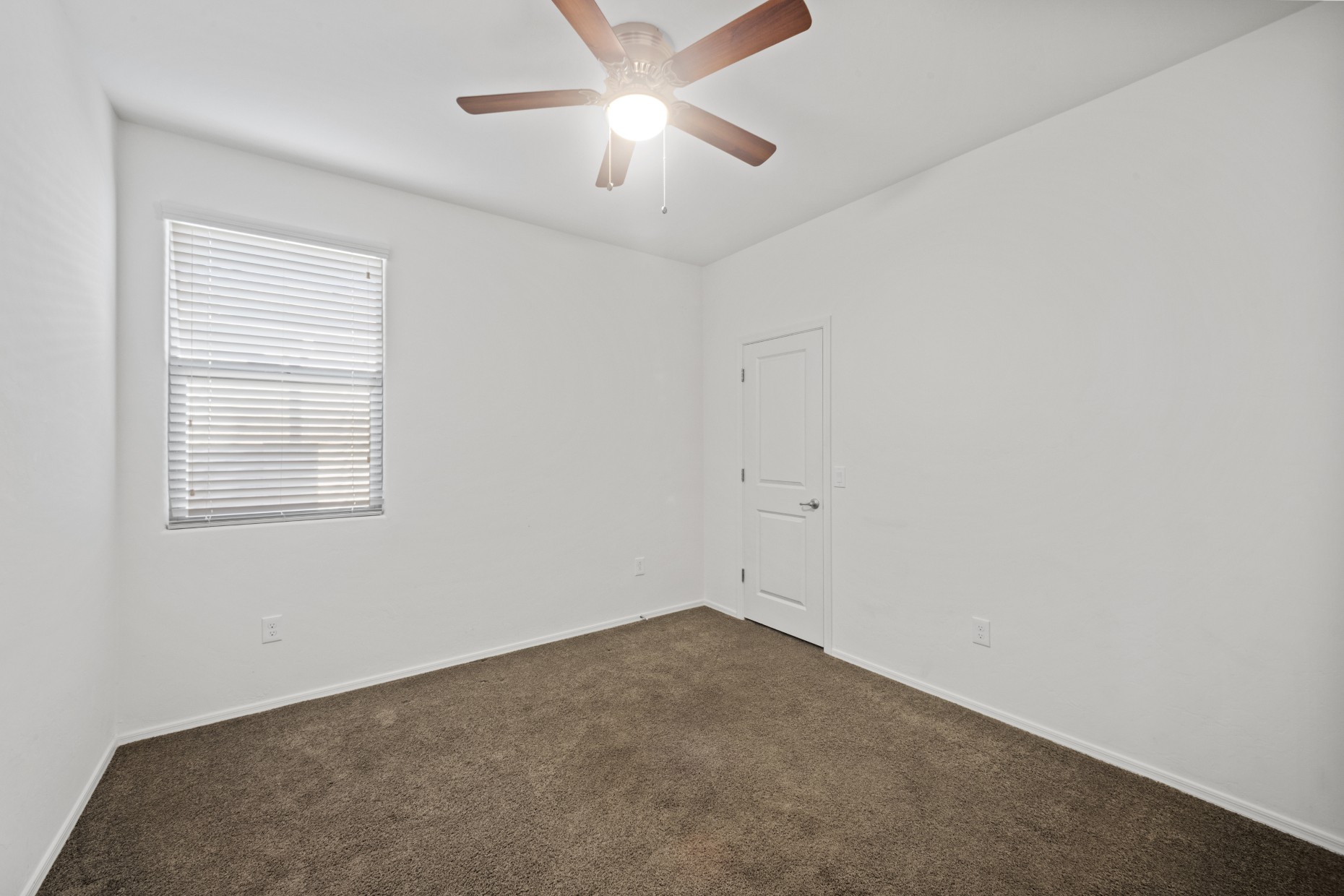 Bedroom with carpet and ceiling fan