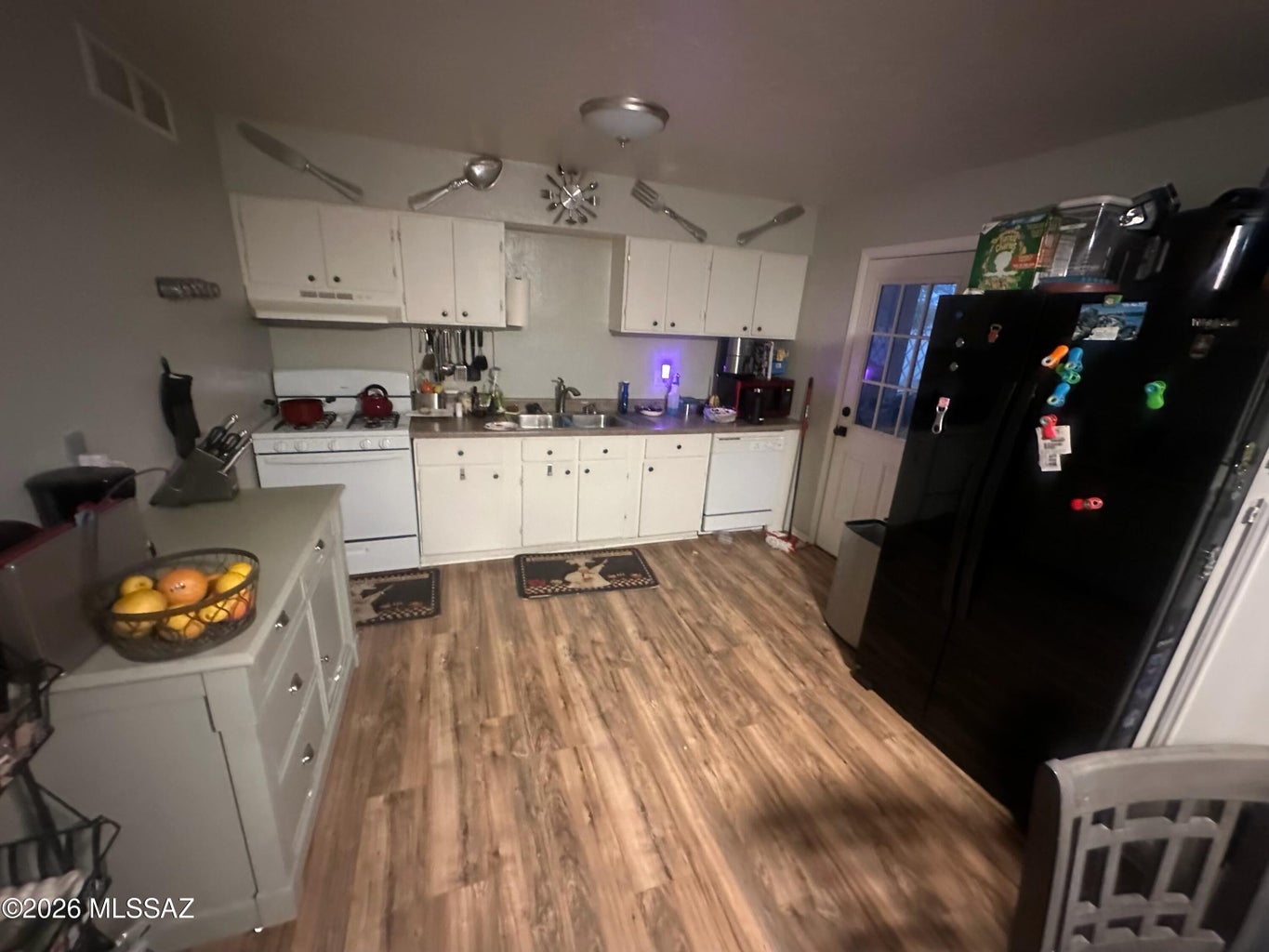 Kitchen with white cabinetry