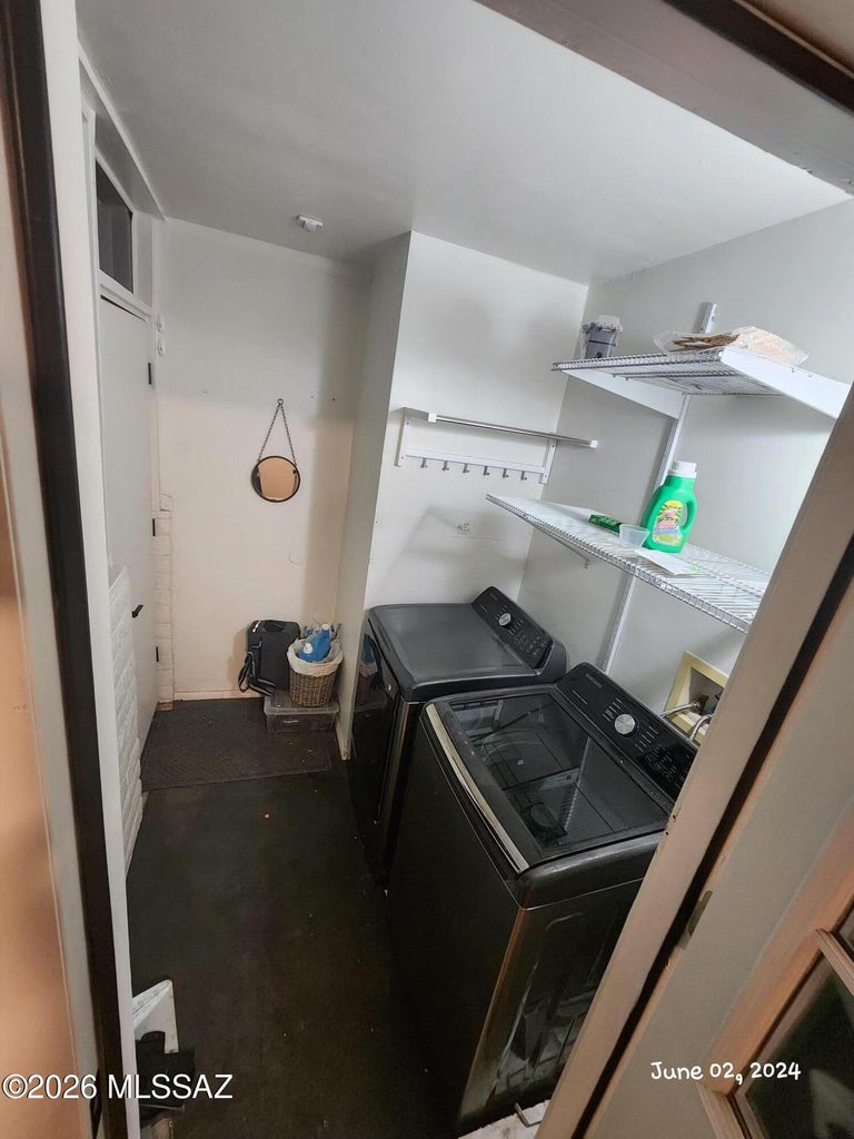 Laundry room with washer and dryer