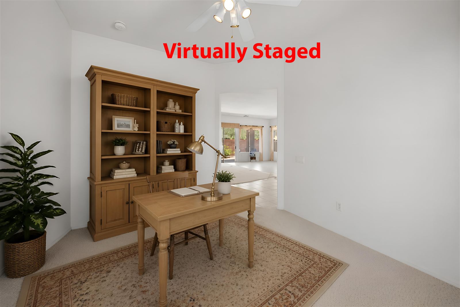 Home office with built-in bookcase, virtually staged