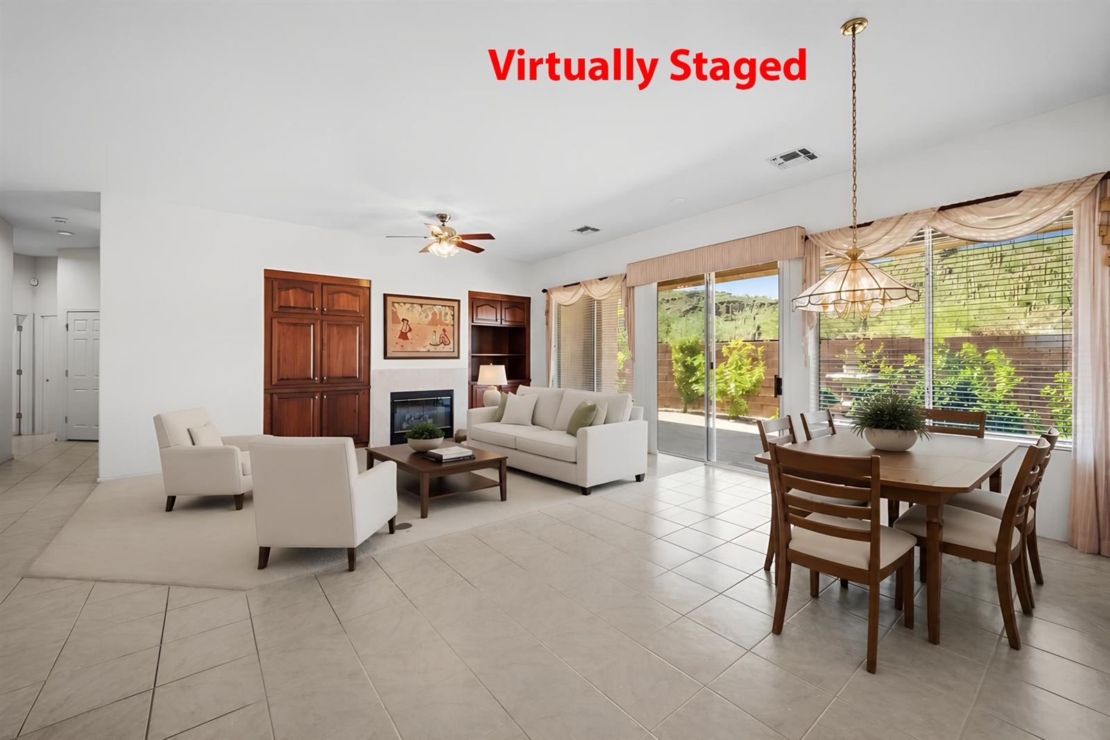 Great room and dining area, virtually staged